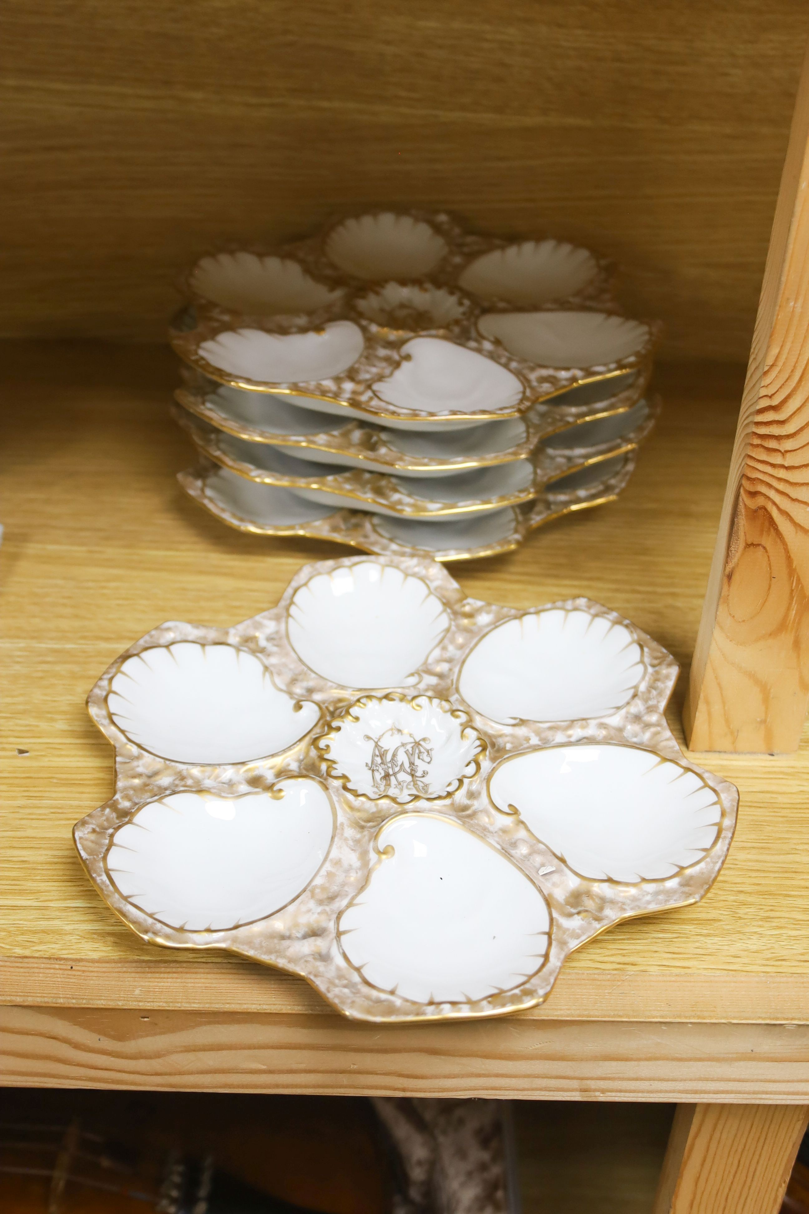 A Limoges porcelain oyster and asparagus service